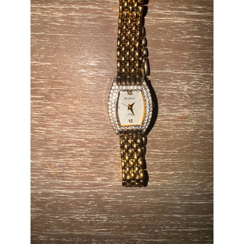 Armitron Gold Tone Womens Watch Rhinestone Bezel Mother of Pearl Style‎ Dial